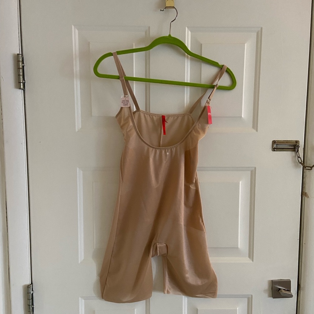 Spanx Open Bust mid thigh bodysuit. New with Tags
